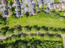 Drone image of Greenprint grass cutting area and houses