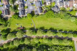 Drone image of Greenprint grass cutting area and houses